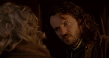 Movie still from “Frankenstein” (1994), directed by Kenneth Branagh – A person with a beard; Close Up shot, Over the shoulder angle