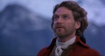 Movie still from “Frankenstein” (1994), directed by Kenneth Branagh – A person with long hair; Close Up shot, Low angle