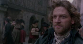 Movie still from “Frankenstein” (1994), directed by Kenneth Branagh – A person with a beard; Close Up shot, Over the shoulder angle