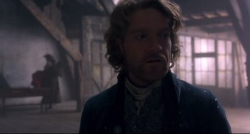 Movie still from “Frankenstein” (1994), directed by Kenneth Branagh – A person with a beard; Close Up shot, Over the shoulder angle