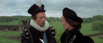 Movie still from “Mary, Queen of Scots” (1971), directed by Charles Jarrott – A man and a woman in medieval garb talking to each other; Close Up shot, Over the shoulder angle
