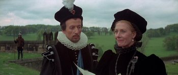Movie still from “Mary, Queen of Scots” (1971), directed by Charles Jarrott – A man and a woman dressed in medieval clothing; Close Up shot, Over the shoulder angle