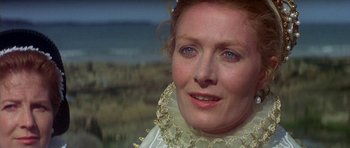 Movie still from “Mary, Queen of Scots” (1971), directed by Charles Jarrott – A person wearing a necklace; Close Up shot, Over the shoulder angle