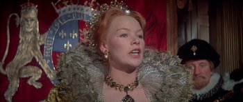 Movie still from “Mary, Queen of Scots” (1971), directed by Charles Jarrott – A person wearing a costume; Close Up shot, Over the shoulder angle
