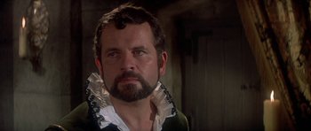 Movie still from “Mary, Queen of Scots” (1971), directed by Charles Jarrott – A person with a beard; Close Up shot, Over the shoulder angle