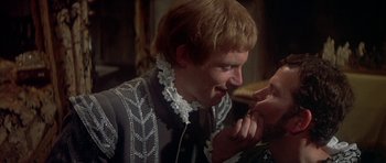 Movie still from “Mary, Queen of Scots” (1971), directed by Charles Jarrott – A young man is brushing his teeth with a tooth brush; Close Up shot, Over the shoulder angle