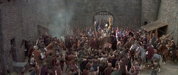 Movie still from “Mary, Queen of Scots” (1971), directed by Charles Jarrott – A crowd of people gathered in a building; Extreme Wide shot, High angle
