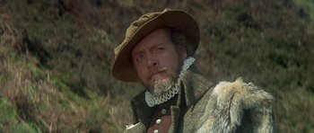 Movie still from “Mary, Queen of Scots” (1971), directed by Charles Jarrott – A person wearing a hat; Close Up shot, Low angle
