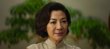 Movie still from “Master Z: The Ip Man Legacy” (2018), directed by Woo-Ping Yuen – A person with short hair; Close Up shot, Low angle