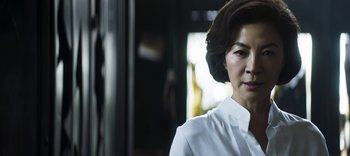 Movie still from “Master Z: The Ip Man Legacy” (2018), directed by Woo-Ping Yuen – A person wearing a white shirt; Close Up shot, Low angle