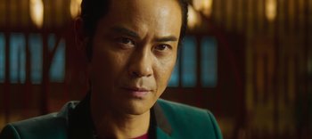 Movie still from “Master Z: The Ip Man Legacy” (2018), directed by Woo-Ping Yuen – A person wearing a jacket; Close Up shot, Low angle