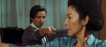 Movie still from “Master Z: The Ip Man Legacy” (2018), directed by Woo-Ping Yuen – A man and a woman holding a knife in their hands; Close Up shot, Over the shoulder angle