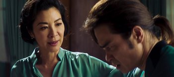Movie still from “Master Z: The Ip Man Legacy” (2018), directed by Woo-Ping Yuen – A man and a woman looking at one another; Close Up shot, Over the shoulder angle