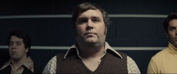 Movie still from “Extremely Wicked, Shockingly Evil and Vile” (2019), directed by Joe Berlinger – A person wearing a sweater; Close Up shot, Low angle