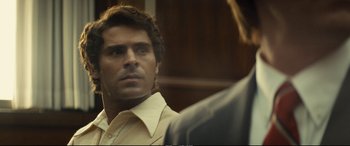 Movie still from “Extremely Wicked, Shockingly Evil and Vile” (2019), directed by Joe Berlinger – A person wearing a shirt; Close Up shot, Over the shoulder angle