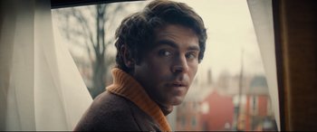 Movie still from “Extremely Wicked, Shockingly Evil and Vile” (2019), directed by Joe Berlinger – A person wearing a jacket; Close Up shot, Over the shoulder angle