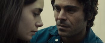 Movie still from “Extremely Wicked, Shockingly Evil and Vile” (2019), directed by Joe Berlinger – A man and a woman looking at one another; Close Up shot, Over the shoulder angle