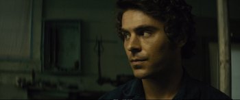 Movie still from “Extremely Wicked, Shockingly Evil and Vile” (2019), directed by Joe Berlinger – A person looking at the camera; Close Up shot, Over the shoulder angle