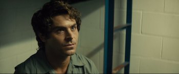 Movie still from “Extremely Wicked, Shockingly Evil and Vile” (2019), directed by Joe Berlinger – A person looking at the camera; Close Up shot, Over the shoulder angle