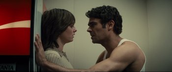 Movie still from “Extremely Wicked, Shockingly Evil and Vile” (2019), directed by Joe Berlinger – A man and a woman face to face in a room; Close Up shot, Over the shoulder angle