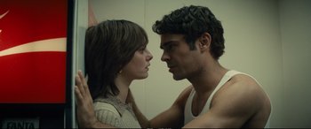 Movie still from “Extremely Wicked, Shockingly Evil and Vile” (2019), directed by Joe Berlinger – A man and a woman face to face in front of a mirror; Close Up shot, Over the shoulder angle