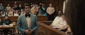 Movie still from “Extremely Wicked, Shockingly Evil and Vile” (2019), directed by Joe Berlinger – A group of people in a court room; Medium shot, Over the shoulder angle