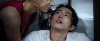 Movie still from “Mayhem” (2017), directed by Joe Lynch – A man and a woman looking into each other's eyes; Close Up shot, Low angle