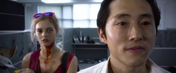 Movie still from “Mayhem” (2017), directed by Joe Lynch – A man and a woman in a room; Close Up shot, Over the shoulder angle