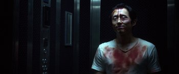 Movie still from “Mayhem” (2017), directed by Joe Lynch – A man with blood all over his face; Close Up shot, Low angle
