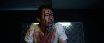 Movie still from “Mayhem” (2017), directed by Joe Lynch – A man with blood all over his face and chest; Close Up shot, Low angle