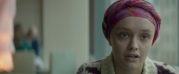 Movie still from “Me and Earl and the Dying Girl” (2015), directed by Alfonso Gomez-Rejon – A person wearing a head scarf; Close Up shot, Over the shoulder angle