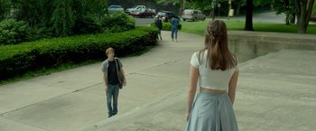 Movie still from “Me and Earl and the Dying Girl” (2015), directed by Alfonso Gomez-Rejon – A man and a woman walking down a sidewalk; Wide shot, Over the shoulder angle