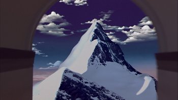 Movie still from “Mean Creek” (2004), directed by Jacob Estes – A person standing on top of a snow covered mountain under a cloudy blue sky; Extreme Wide shot, High angle