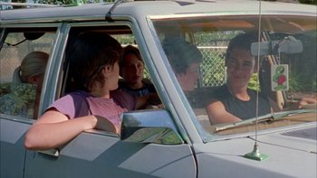 Movie still from “Mean Creek” (2004), directed by Jacob Estes – A group of people sitting in the back of a car; Medium shot, Over the shoulder angle