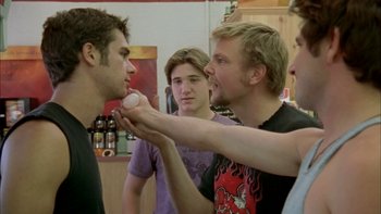 Movie still from “Mean Creek” (2004), directed by Jacob Estes – A group of young men standing next to each other; Medium shot, Over the shoulder angle