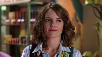 Movie still from “Mean Girls” (2004), directed by Mark Waters – A person wearing a shirt and tie; Close Up shot, Over the shoulder angle