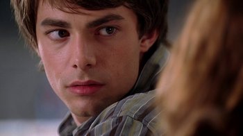 Movie still from “Mean Girls” (2004), directed by Mark Waters – A young man's face; Close Up shot, Over the shoulder angle