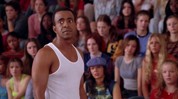 Movie still from “Mean Girls” (2004), directed by Mark Waters – A group of people sitting in front of each other; Medium shot, Over the shoulder angle