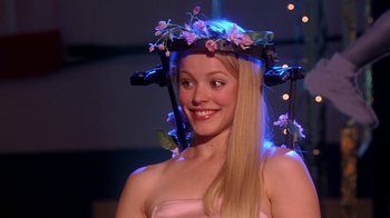 Movie still from “Mean Girls” (2004), directed by Mark Waters – A beautiful blonde woman wearing a flower crown; Close Up shot, Over the shoulder angle