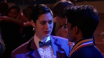 Movie still from “Mean Girls” (2004), directed by Mark Waters – A man and a woman are talking to each other; Medium shot, Over the shoulder angle