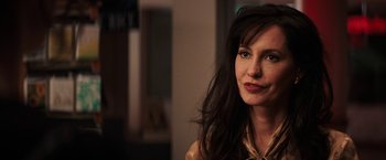 Movie still from “Fear Street: Part One - 1994” (2021), directed by Leigh Janiak – A person with long black hair; Close Up shot, Over the shoulder angle