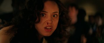 Movie still from “Fear Street: Part One - 1994” (2021), directed by Leigh Janiak – A person with her mouth open; Close Up shot, Low angle