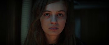 Movie still from “Fear Street: Part One - 1994” (2021), directed by Leigh Janiak – A person with long hair; Close Up shot, Low angle