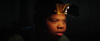 Movie still from “Fear Street: Part One - 1994” (2021), directed by Leigh Janiak – A young man wearing a hard hat with a light on his head; Close Up shot, Low angle