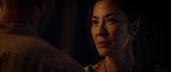 Movie still from “Mechanic: Resurrection” (2016), directed by Dennis Gansel – A person looking at the camera; Close Up shot, Over the shoulder angle