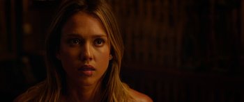 Movie still from “Mechanic: Resurrection” (2016), directed by Dennis Gansel – A person with long blonde hair; Close Up shot, Over the shoulder angle