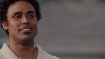 Movie still from “Meet the Browns” (2008), directed by Tyler Perry – A man's face in a white shirt; Close Up shot, Low angle