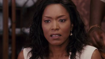 Movie still from “Meet the Browns” (2008), directed by Tyler Perry – A person wearing a white shirt; Close Up shot, Over the shoulder angle