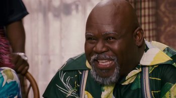 Movie still from “Meet the Browns” (2008), directed by Tyler Perry – An older black man with a beard smiling for the camera; Close Up shot, High angle