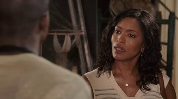 Movie still from “Meet the Browns” (2008), directed by Tyler Perry – A woman talking to a man; Close Up shot, Over the shoulder angle
